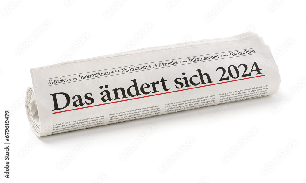 Zeitungsrolle mit der Überschrift Das ändert sich 2024 - obrazy, fototapety, plakaty 