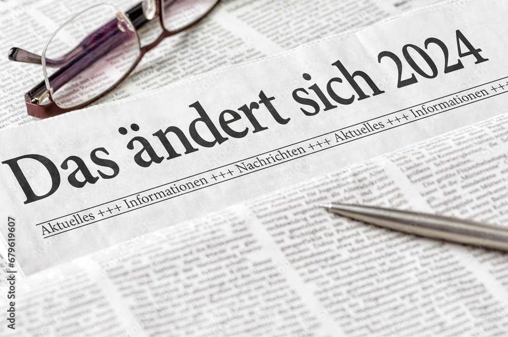 Zeitung mit der Überschrift Das ändert sich 2024 - obrazy, fototapety, plakaty 