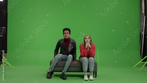 GREEN SCREEN Multi-racial couple pretending they are visiting a museum or art exhibition  (ID: 679619609)