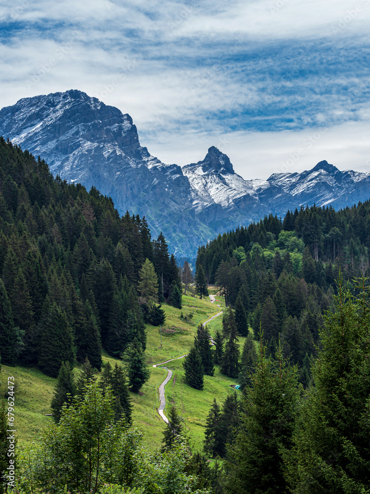 Summer travel to the Swiss Alps. Sun, warm beautiful weather, relaxation and travel.