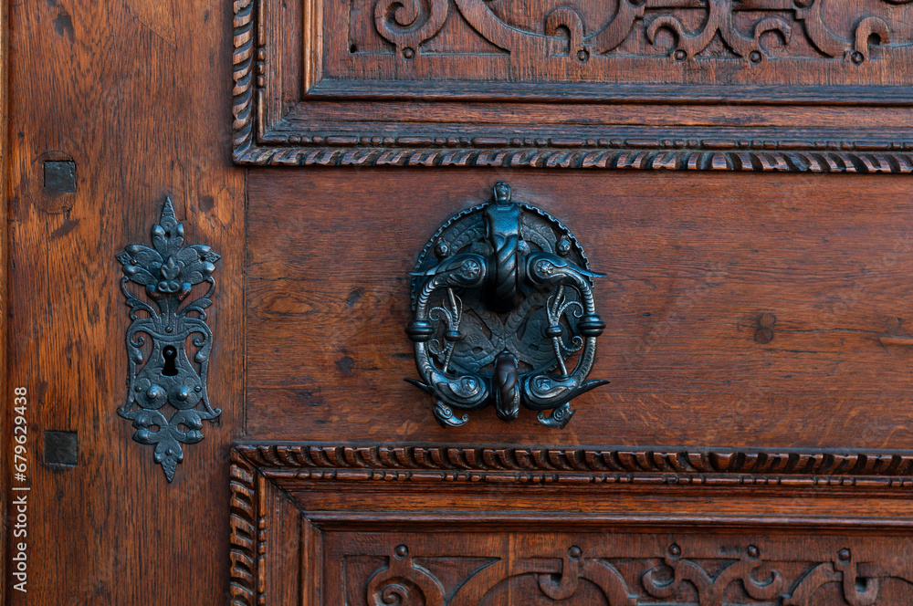 door knocker on an old wooden door in Czechia, Prague