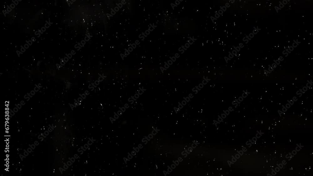 Close-up of a window, at night, during the rain. Drops fall on the glass. Close-up of a window, at night, during the rain. Drops fall on the glass.