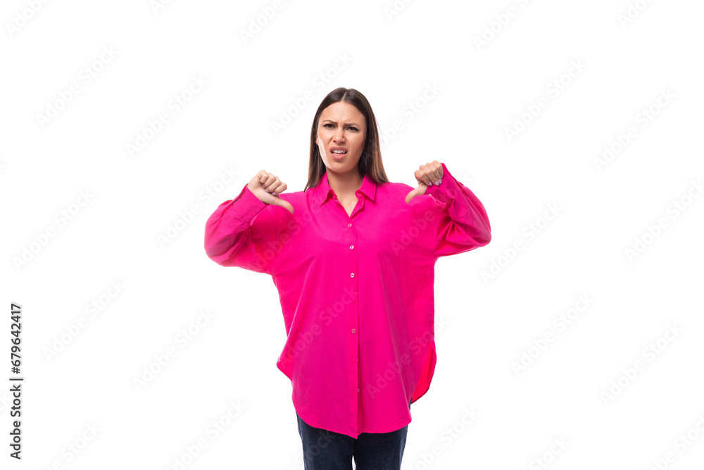young caucasian brunette woman in crimson stylish shirt has doubts showing like and dislike young caucasian brunette woman in crimson stylish shirt has doubts showing like and dislike
