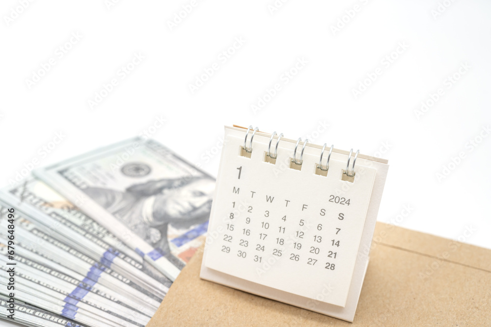 Obraz premium Envelope With Money And Calendar. opens envelope with money, dollars. Pension Concept. Bonus Money. isolated on white background.
