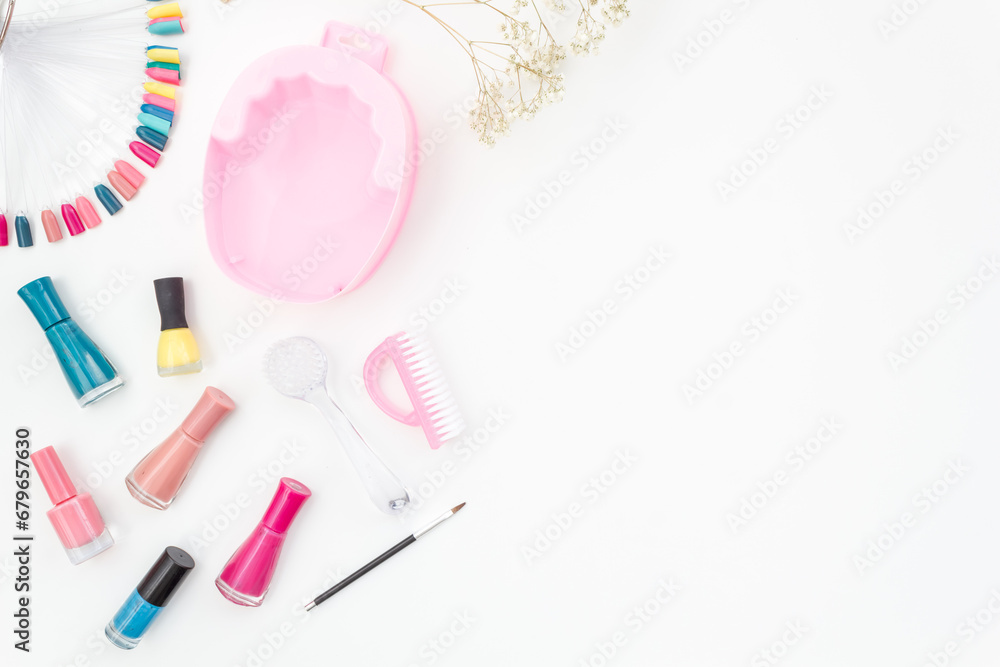 Manicure set with nail tools and palette of nail polish, top view. Beauty cosmetic products Manicure set with nail tools and palette of nail polish, top view. Beauty cosmetic products