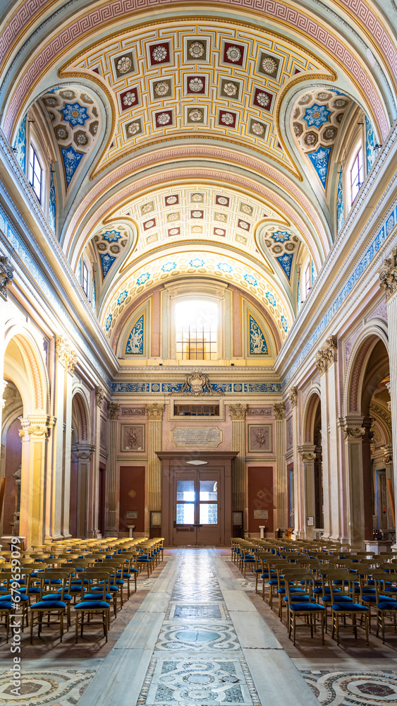 View of beautiful nave hall inside catholic church in Italy