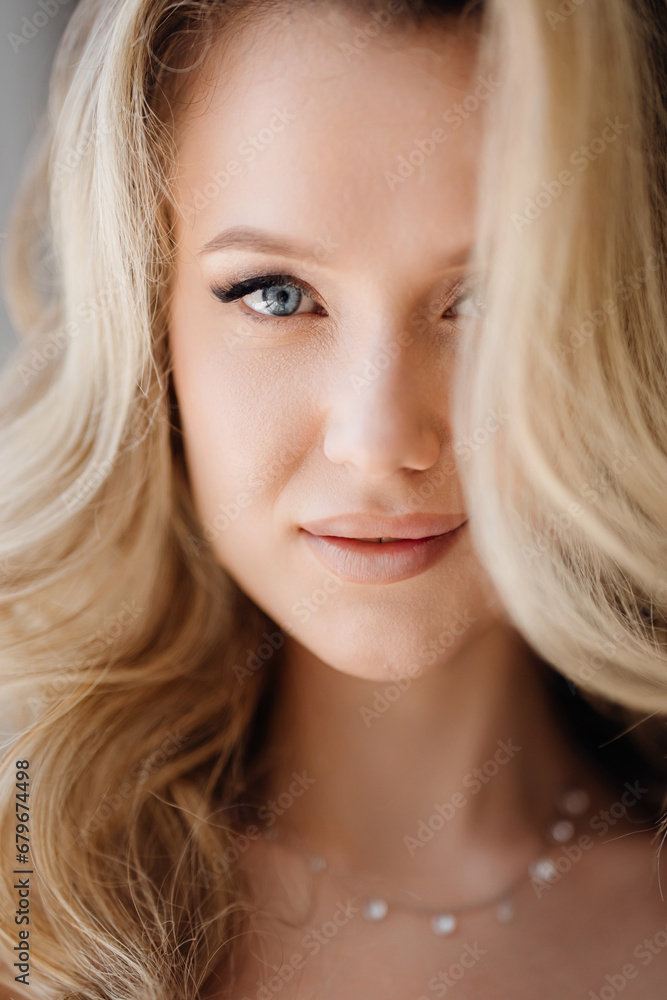 Portrait of a beautiful young blonde woman. Women's beauty. Portrait of a beautiful young blonde woman. Women's beauty.