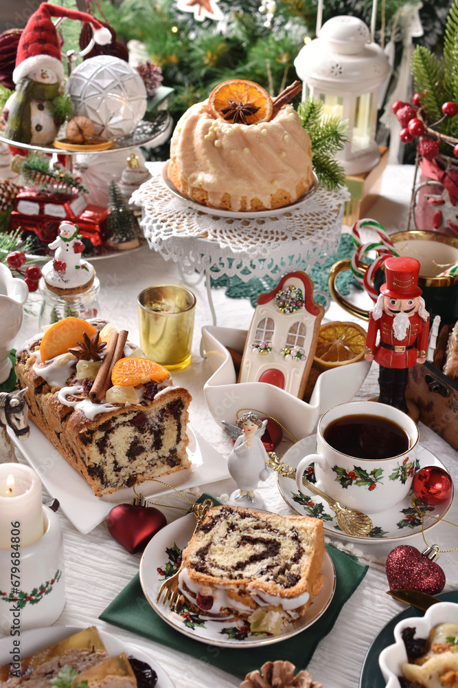 Traditional Christmas pastries on festive table with decors