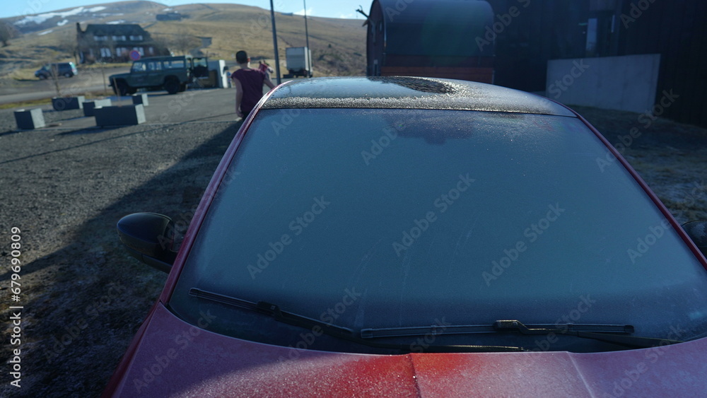 Obraz premium Winter Morning Snowy Frost on Vehicle Windshield and surface