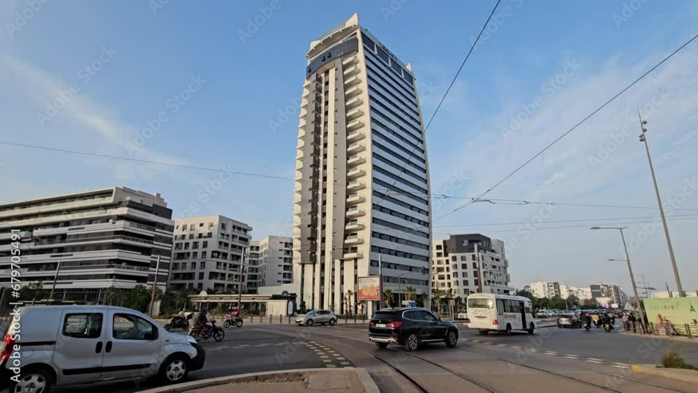 Casablanca, Morocco - 23 November 2023 - street view, and traffics against Capital Tower by Legacy Capital in Casablanca Finance City or CFC
Casablanca, Morocco - 23 November 2023 - street view, and traffics against Capital Tower by Legacy Capital in Casablanca Finance City or CFC