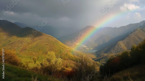 View of a rainbow at sunset next to the beautiful mountain. Beautiful natural landscapes.