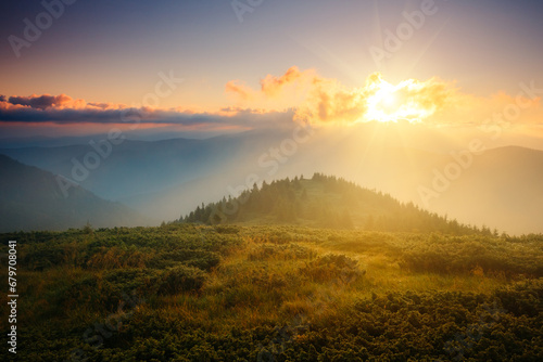 A breathtaking view of the mountain ranges lit by the sun. Carpathian mountains, Ukraine, Europe.
