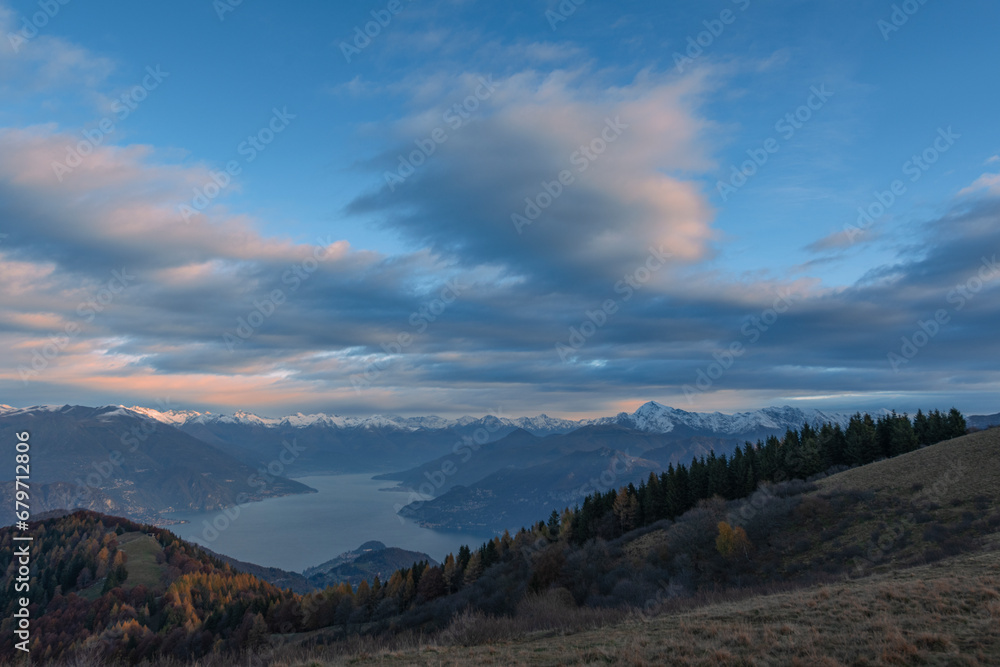 Sunrise on Como's lake from mountain peak Sunrise on Como's lake from mountain peak