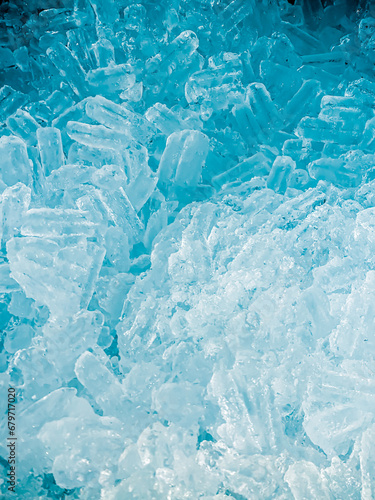 icecubes background,icecubes texture icecubes wallpaper,ice helps to feel refreshed and ice helps the water to relax,made for advertising business of various bans,making ice,drinks or refreshments. © Charisia