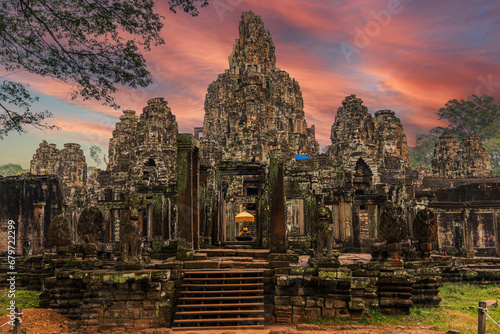 The famous Bayon temple with ancient stone faces, Angkor War, Cambodia photo