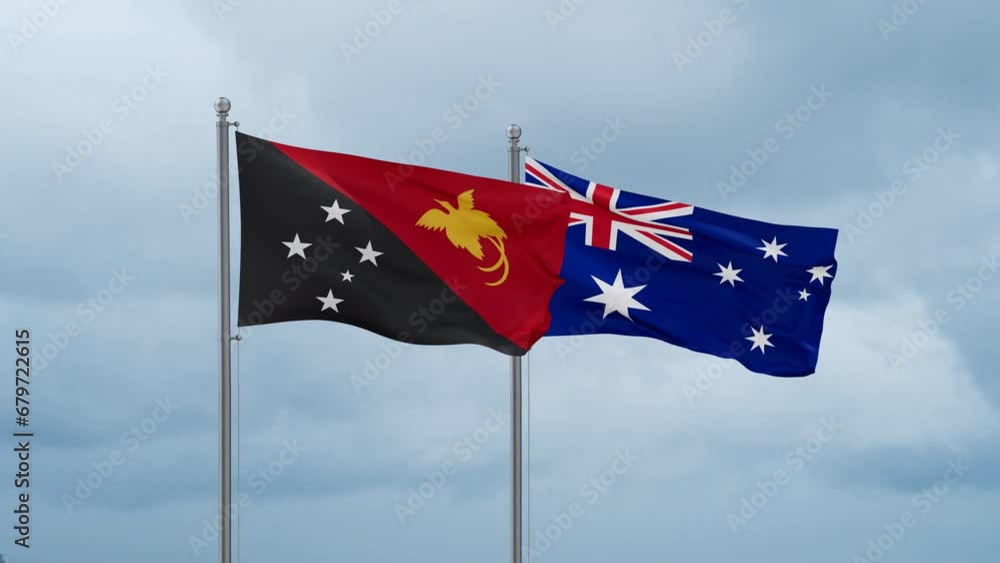 Australia flag and Papua New Guinea flag waving together on cloudy sky, endless seamless loop, two country relations concept Australia flag and Papua New Guinea flag waving together on cloudy sky, endless seamless loop, two country relations concept
