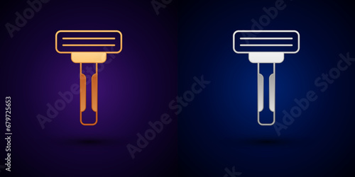 Gold and silver Shaving razor icon isolated on black background. Vector