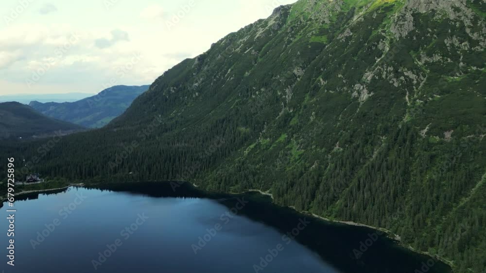 Morskie Oko, Tatra's biggest lake, nestled in Tatra National Park, Poland. Found in Rybi Potok (Fish Brook) Valley, by the base of Mieguszowiecki Summits. Zakopane, Poland. High Tatra Mountains Morskie Oko, Tatra's biggest lake, nestled in Tatra National Park, Poland. Found in Rybi Potok (Fish Brook) Valley, by the base of Mieguszowiecki Summits. Zakopane, Poland. High Tatra Mountains