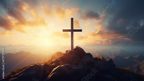 Jesus Christ cross on an amazing mountain sunset background with dramatic lighting and sunbeams. Easter, resurrection concept. Christian wooden cross