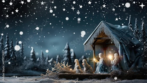 Nativity scene, Christian Christmas concept, Birth of Jesus Christ. Wooden manger with holy child in barn in dark blue night. photo