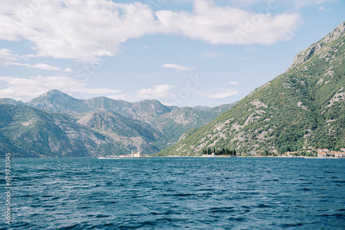 St. George Island in the Bay of Kotor against the backdrop of a high mountain range. Montenegro