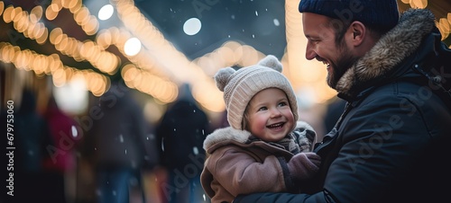 young baby girl with father closeup portrait smiling at Christmas festival at night time with bokeh light, winter fun fair happiness time, Generative Ai © QuietWord