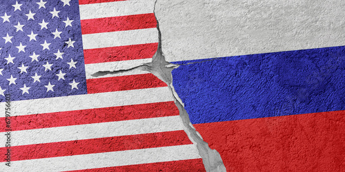 USA and Russia flags on a stone wall with a crack, illustration of the concept of a global crisis in political and economic relations
