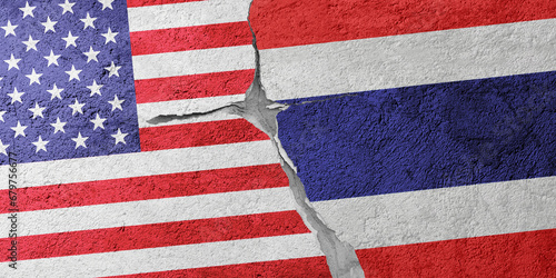 USA and Thailand flags on a stone wall with a crack, illustration of the concept of a global crisis in political and economic relations