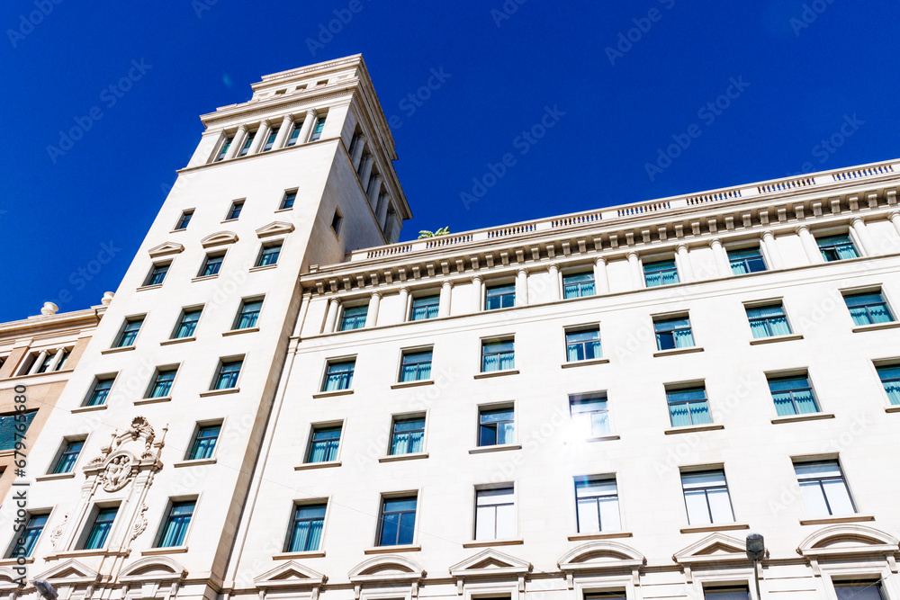 Facade of an old office building at plaza Catalunya square in Barcelona, Catalonia, Spain, Europe
