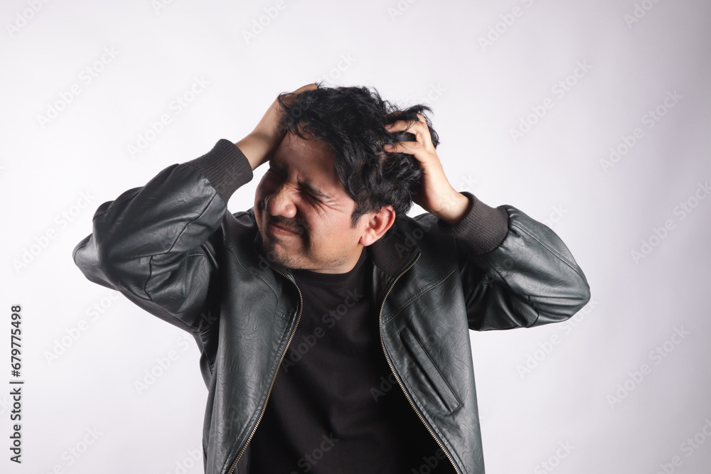 Photograph of person with headache. Concept of health and diseases. Photograph of person with headache. Concept of health and diseases.