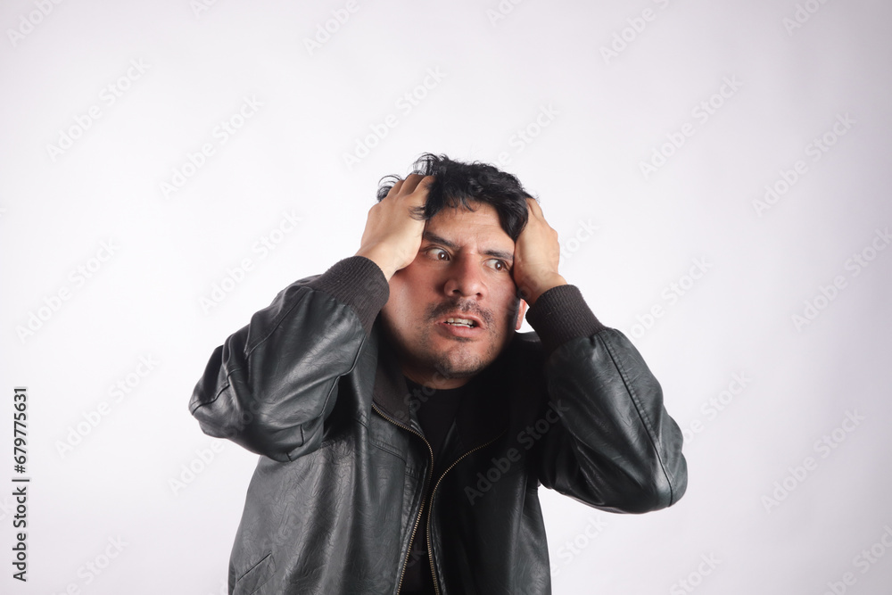 Photograph of person holding his head very annoying. Concept of emotions and stress. Photograph of person holding his head very annoying. Concept of emotions and stress.