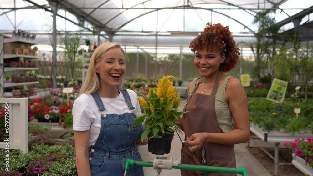 Two woman in streamer interview looking at camera speaking about plants