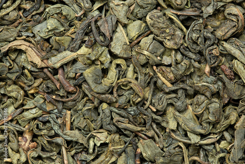 macro of dry green tea leaves