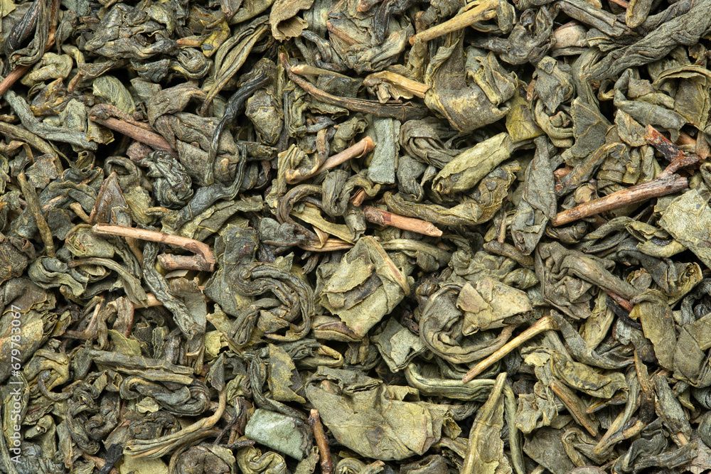 macro of dry green tea leaves macro of dry green tea leaves