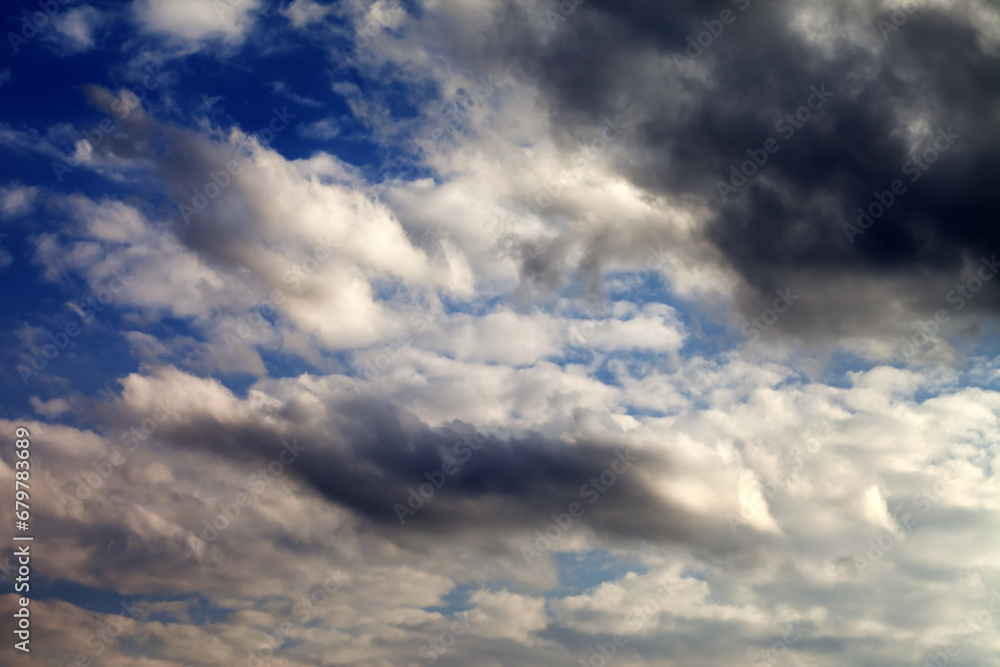 Blue sky with sunlight and dark clouds Blue sky with sunlight and dark clouds