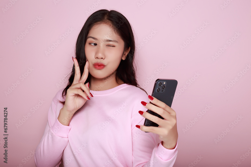 Asian woman cheerfully posing with a mobile, A beautiful young woman is feeling cheerful and happy., half body photo of nice positive lady, Portrait of a beautiful young woman in pink background, Asian woman cheerfully posing with a mobile, A beautiful young woman is feeling cheerful and happy., half body photo of nice positive lady, Portrait of a beautiful young woman in pink background,