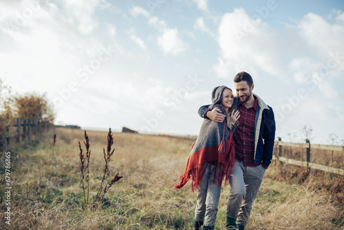 Young couple having serene walk in the countryside © Geber86