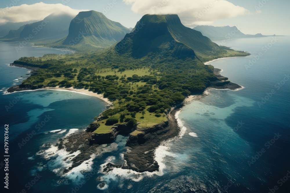 A large tropical curved island with an inactive volcano and rocky coastline, Aerial high view.