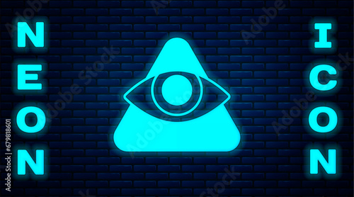 Glowing neon Masons symbol All-seeing eye of God icon isolated on brick wall background. The eye of Providence in the triangle. Vector