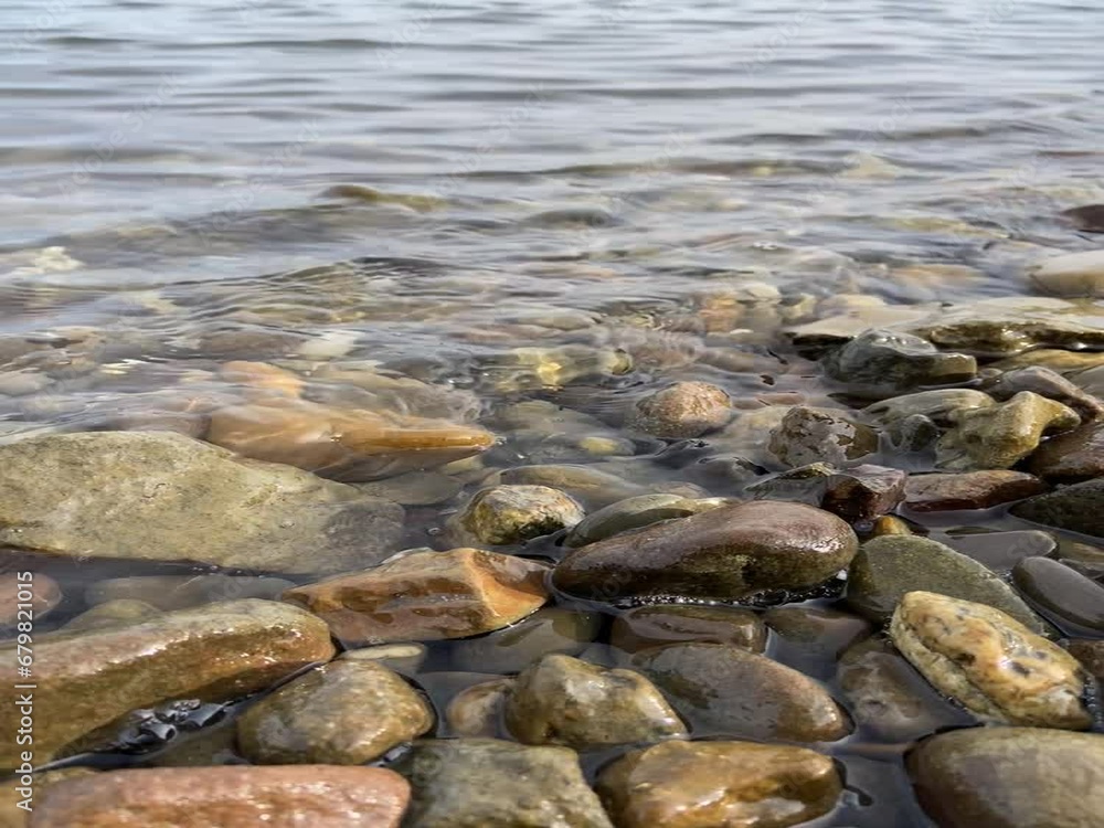 stones on the beach water comes stones on the beach water comes