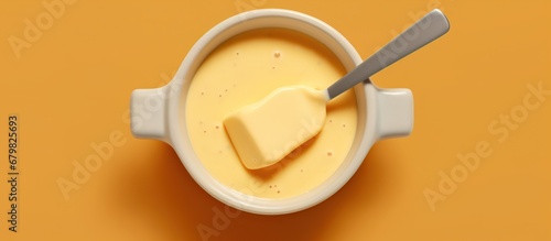 Cup of coffee with cream on the orange background. 3d rendering photo