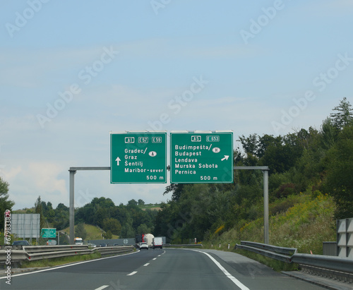 Photography road signs on the motorways to reach Austrian cities or the border towards Budap