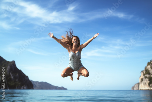 Joyful Leap: Young Woman Enjoying Vacation by Water