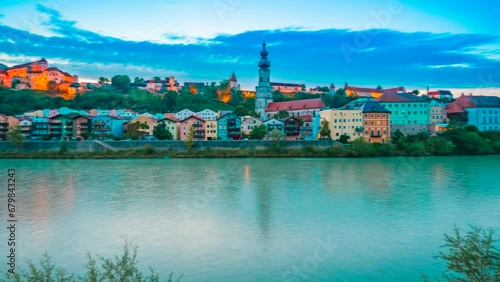 Village of Burghausen in Bavaria, Germany. View from the Austrian side over the River Salzach. Timelapse Video during sunset