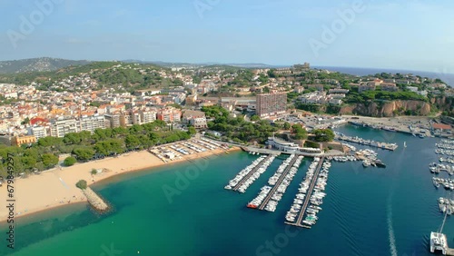  Sant Feliu de Guixols in costa brava aerial views spanish turistic touwn with the mediterranean sea blue transparent  photo