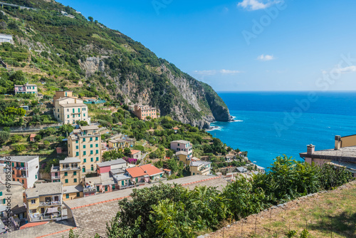 Hill with houses set in the mountain next to the Mediterranean Sea, Riomaggiore ITALY