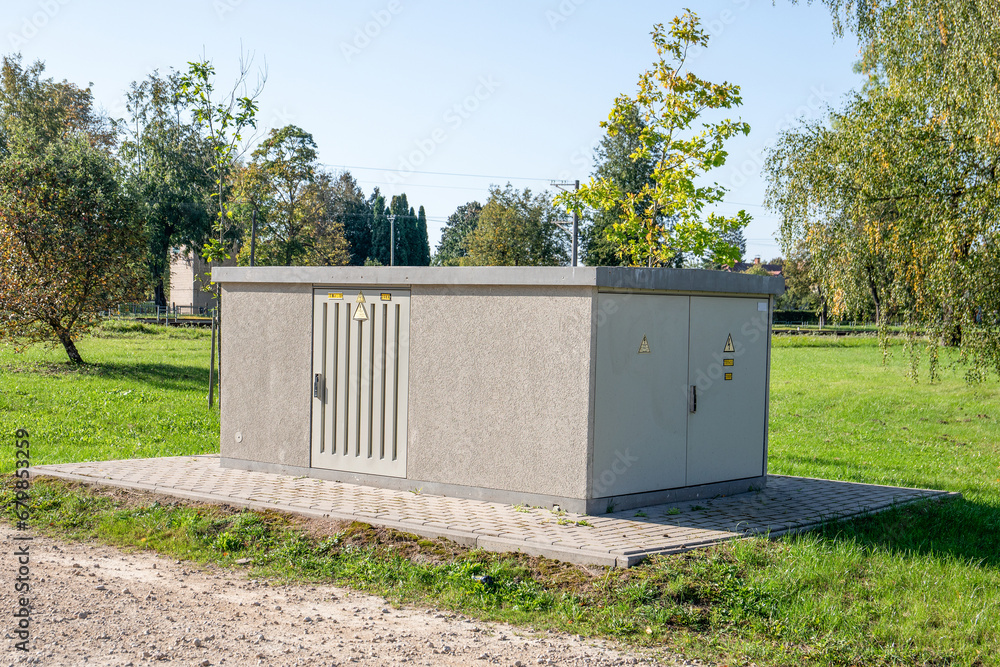 Electric power transformer. Outdoor space, park and green area