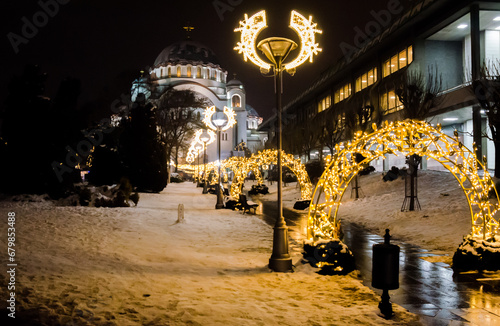 Church of Saint Sava and a park in front of the temple decorated with New Year's decorations.