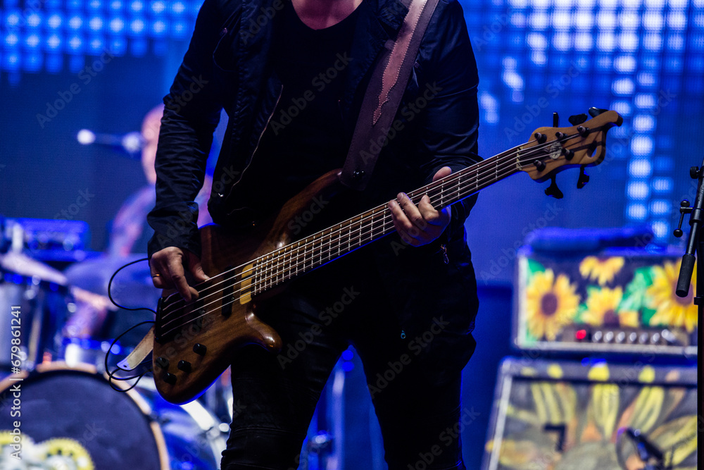 Obraz premium Guitar player on stage. Space for copy.