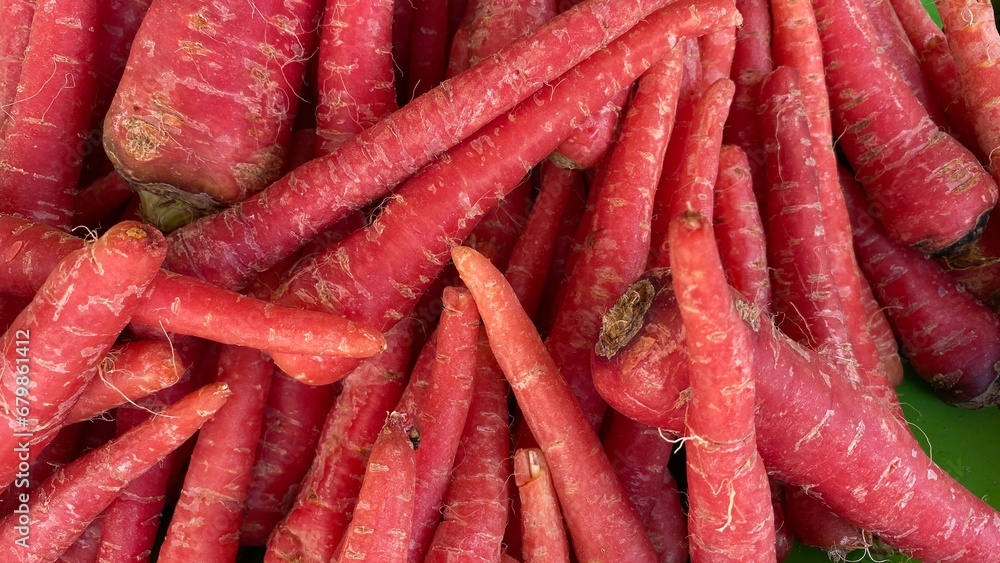 Fresh carrot background in the market